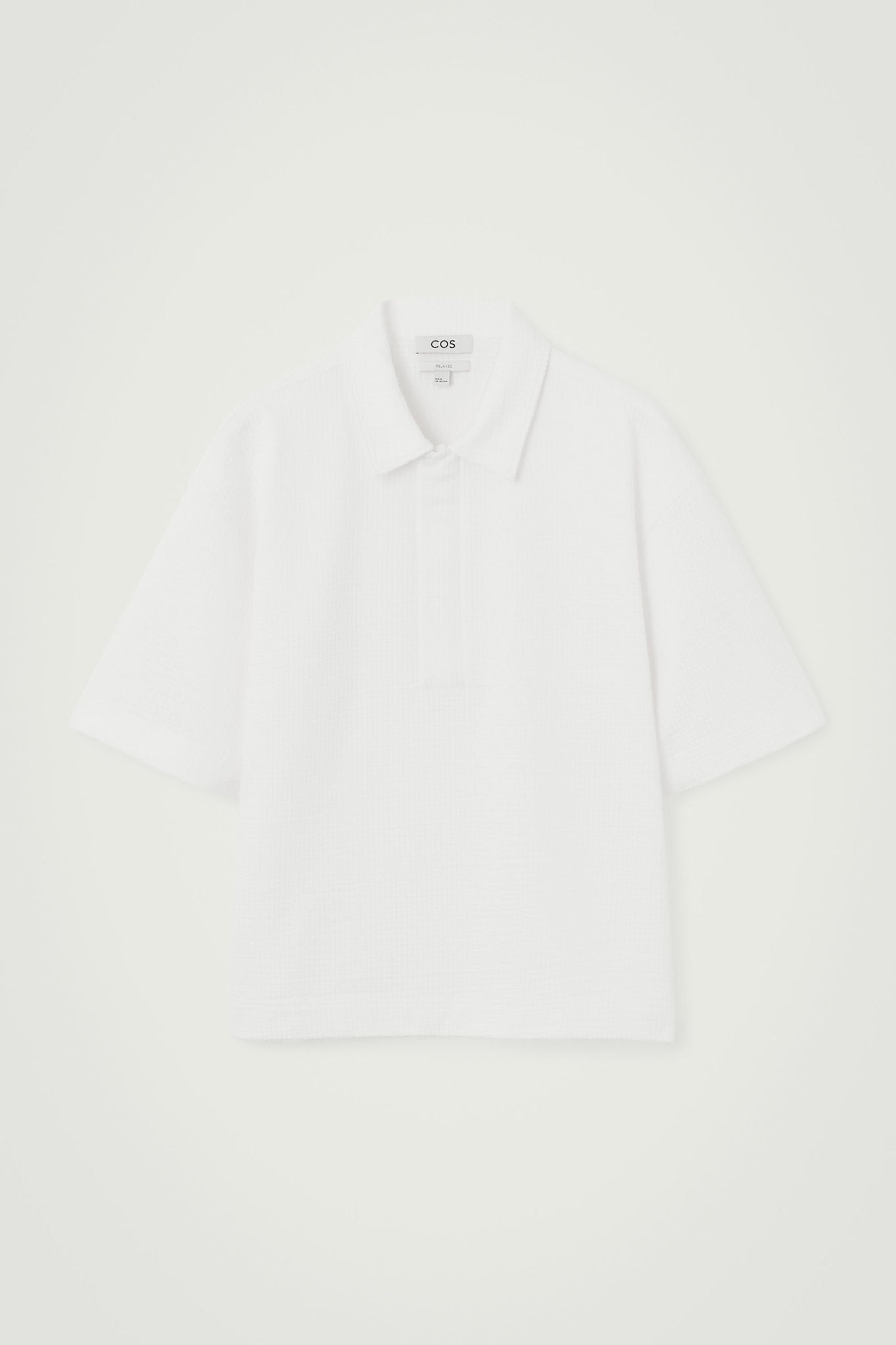 Shop TEXTURED HALF-ZIP POLO SHIRT online | COS UAE