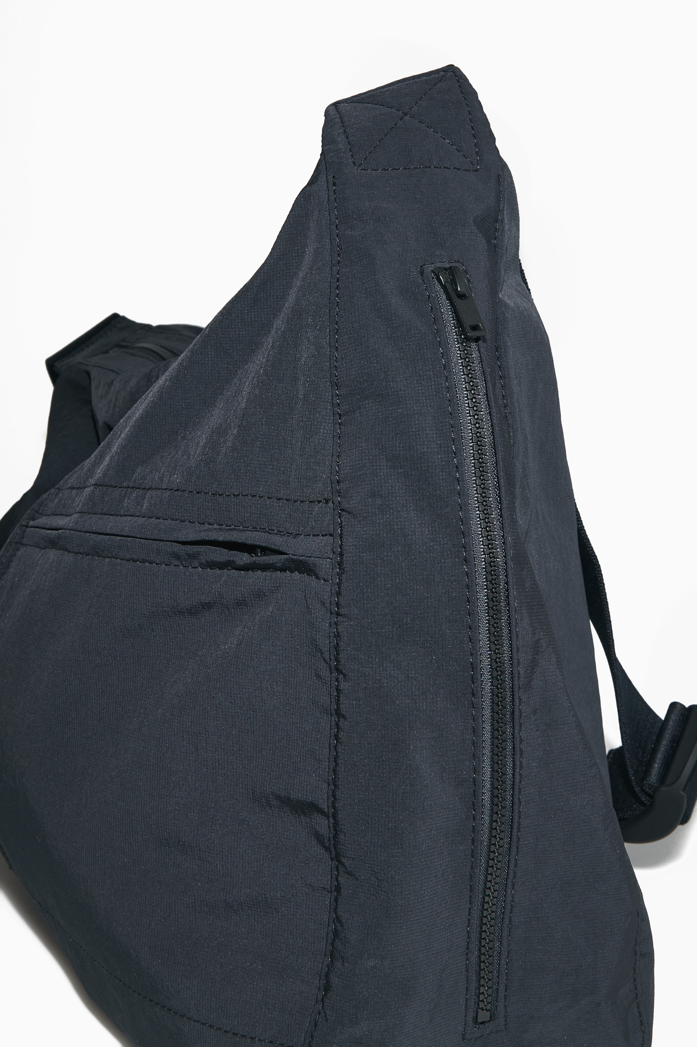 Nylon Crescent Messenger Bag | COS Kuwait