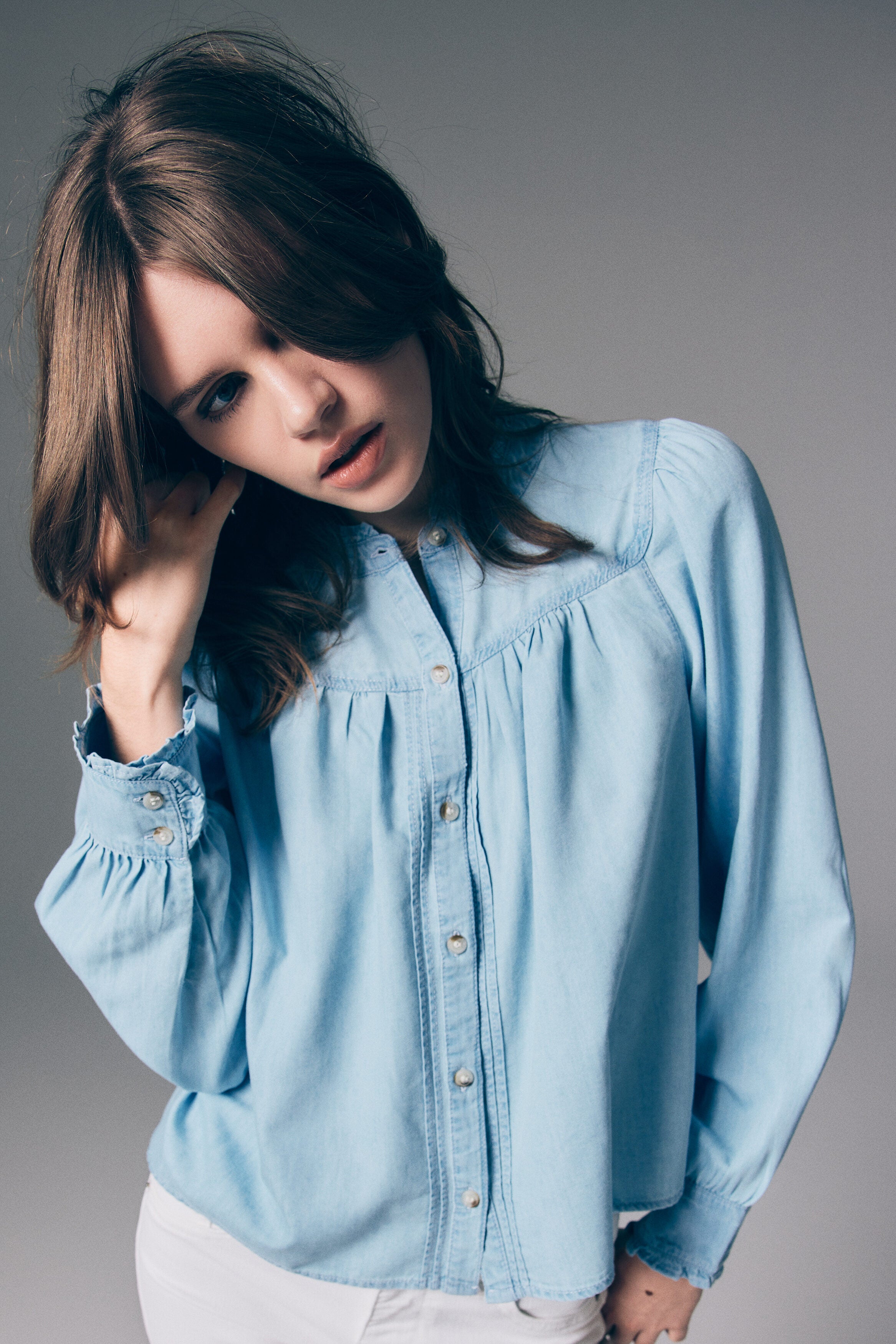 Frill-trimmed denim blouse