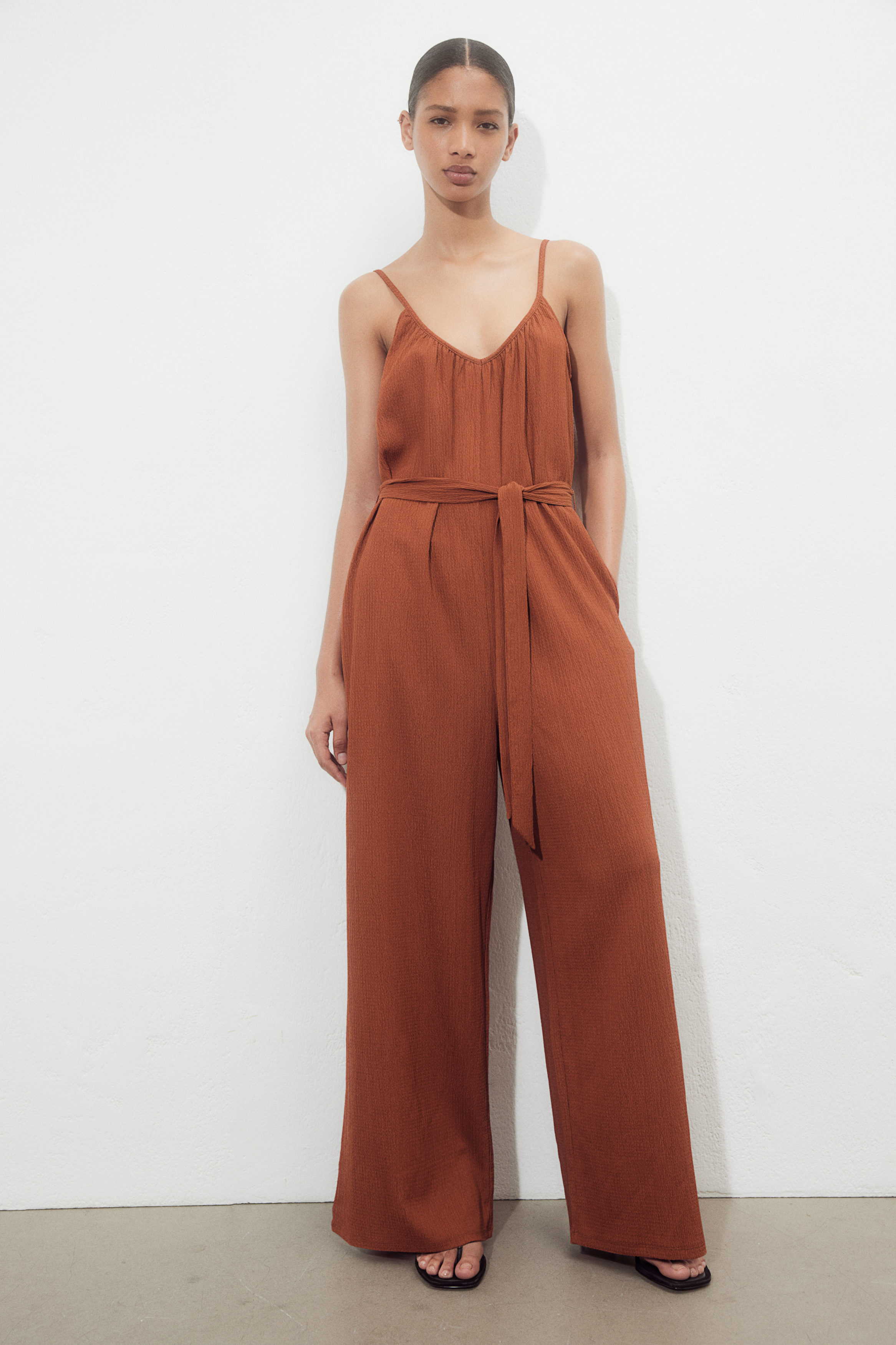 Tie belt jersey jumpsuit