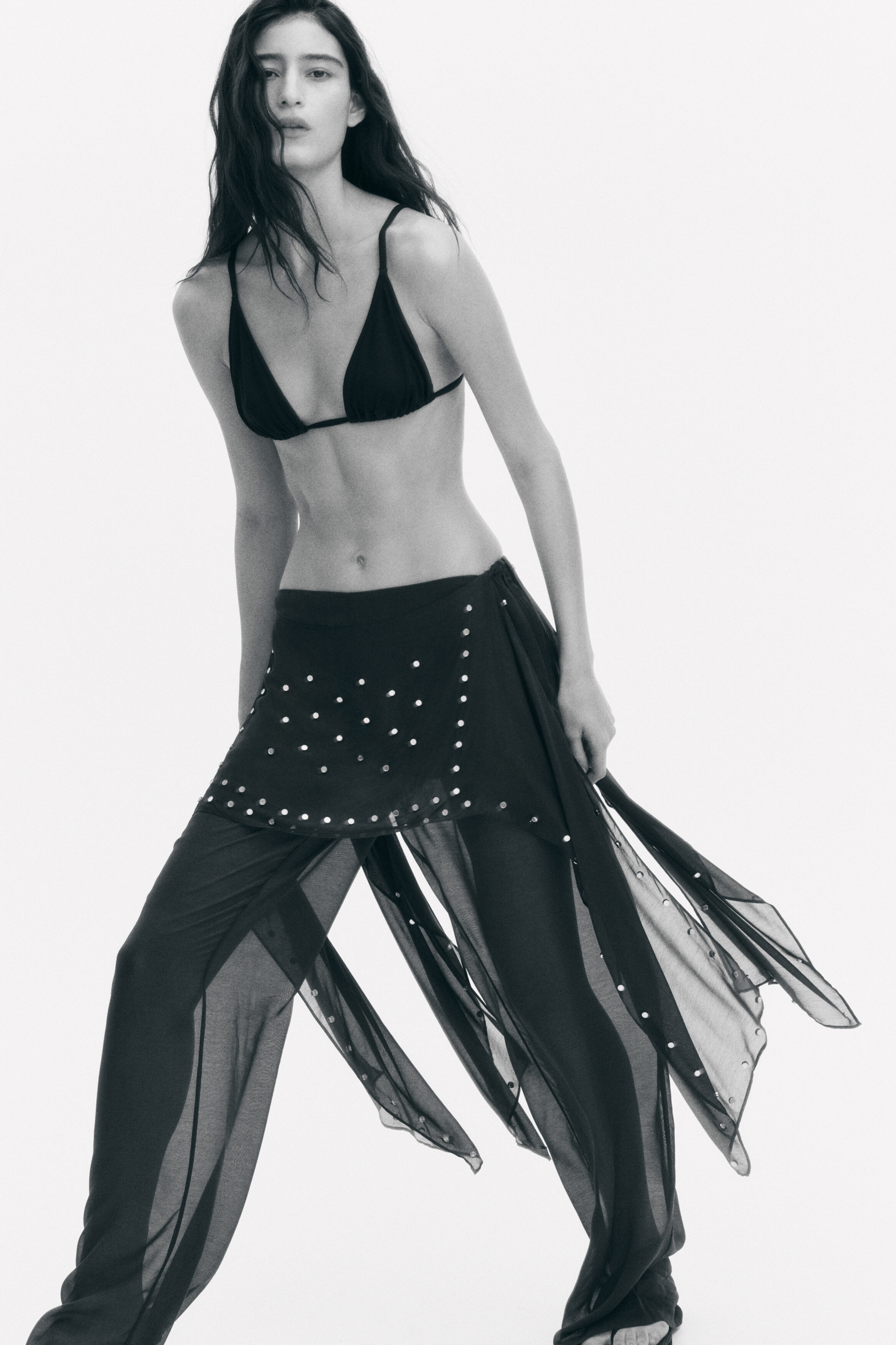 Studded skirt-layered trousers