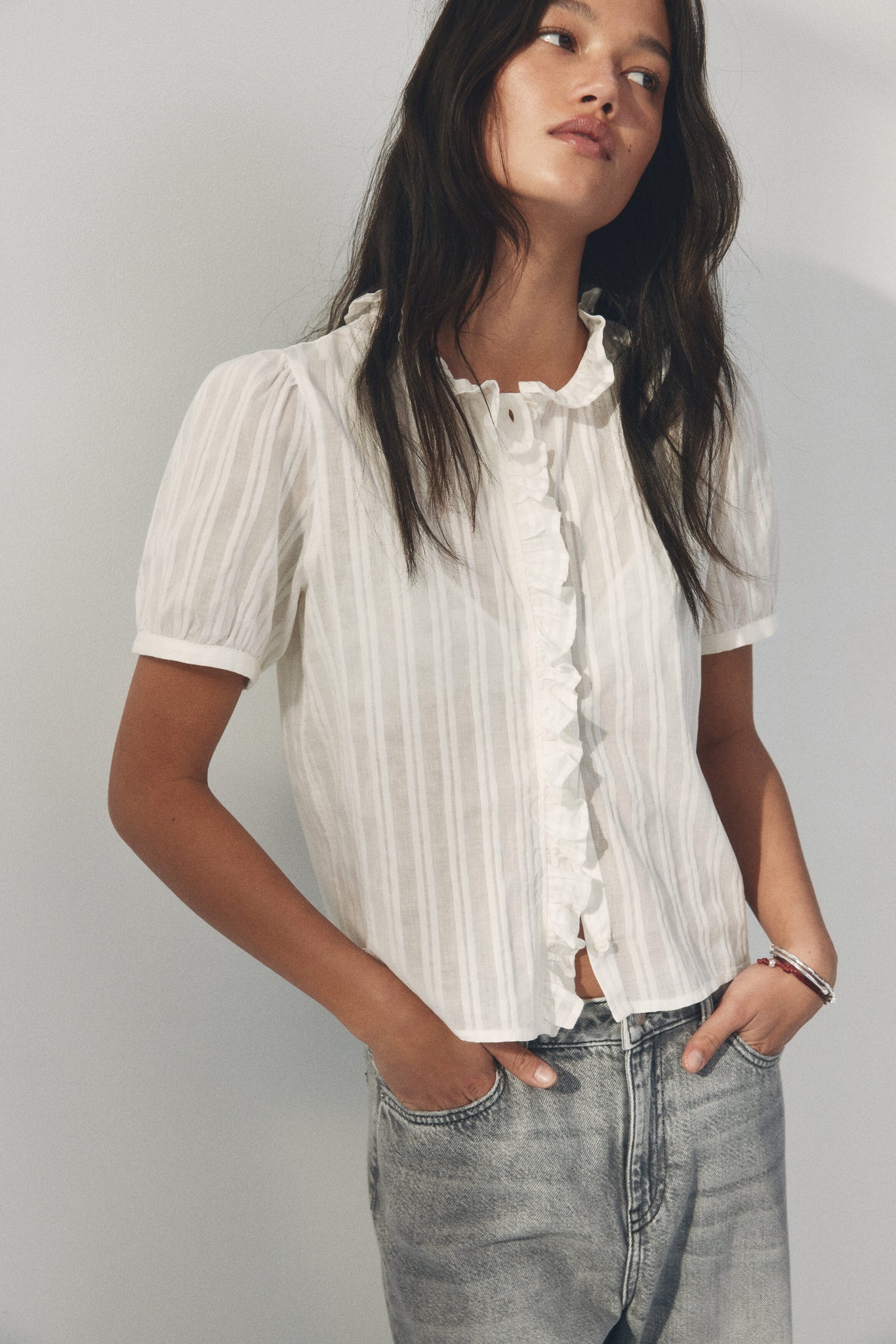 Frill-trimmed cotton blouse